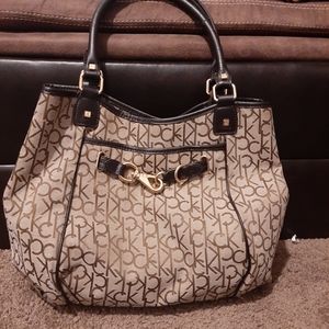 Calvin Klein tan kahki brown ck log shoulder purse